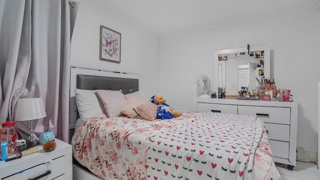 bedroom featuring crown molding