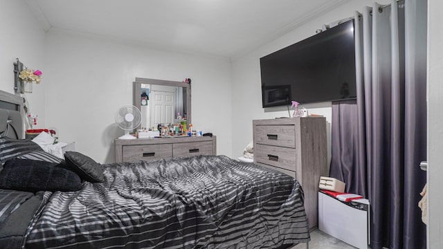 bedroom featuring ornamental molding