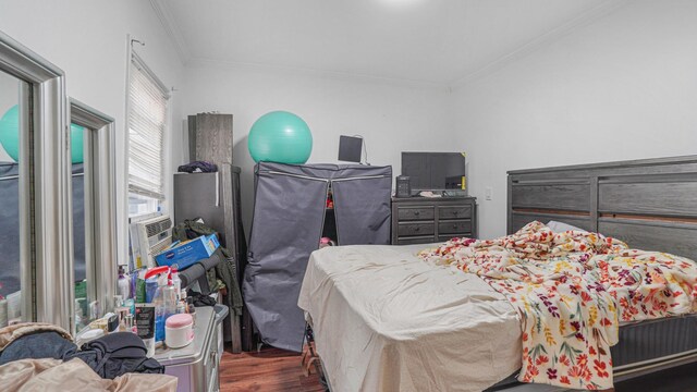 2354 Waterbury Ave, Bronx, NY 10462 - bedroom with crown molding and wood finished floors