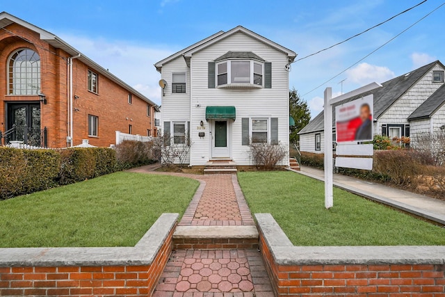 front of property with a front yard