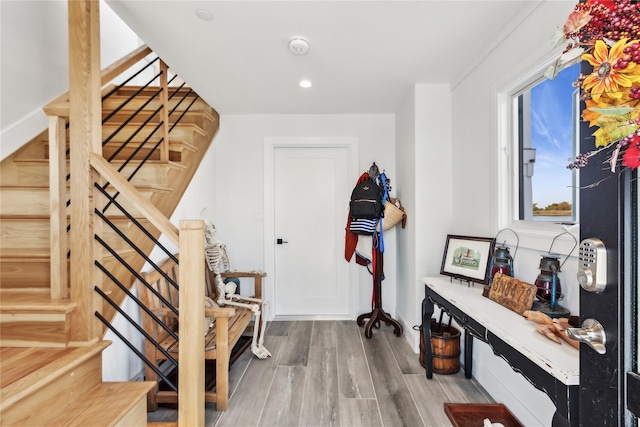 corridor featuring hardwood / wood-style floors