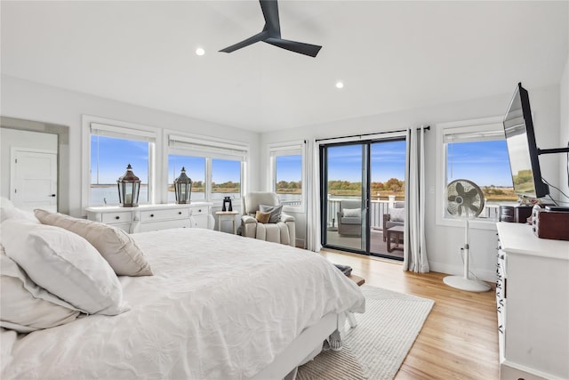 bedroom featuring access to outside, ceiling fan, and light hardwood / wood-style floors