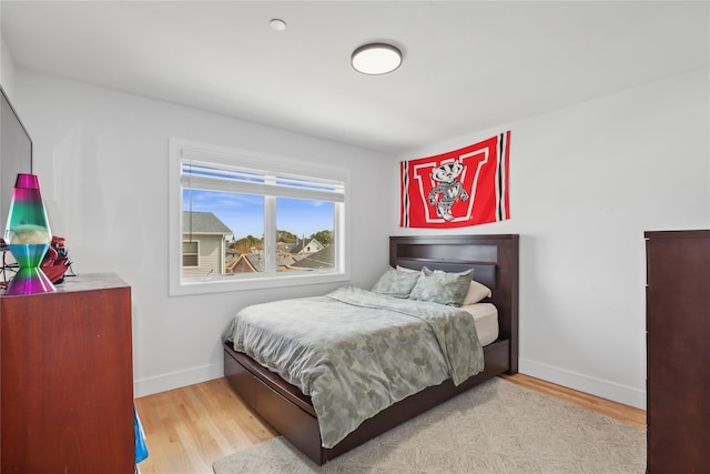 bedroom featuring light hardwood / wood-style flooring