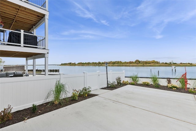 view of patio / terrace featuring a water view