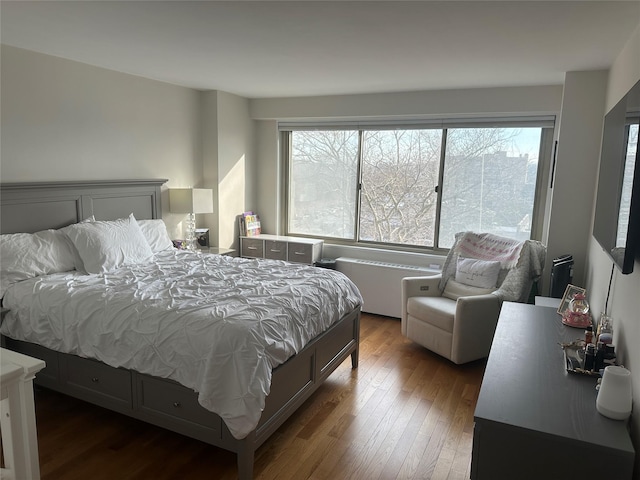 bedroom featuring dark hardwood / wood-style floors