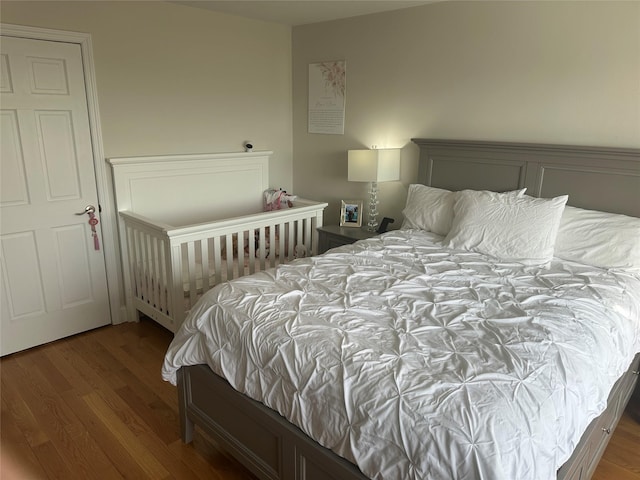 bedroom featuring hardwood / wood-style flooring