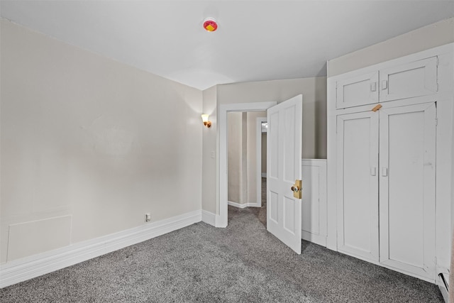 unfurnished bedroom with carpet