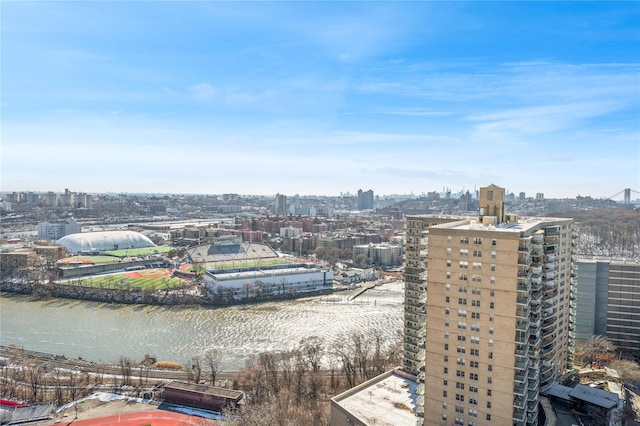 drone / aerial view with a water view and a city view