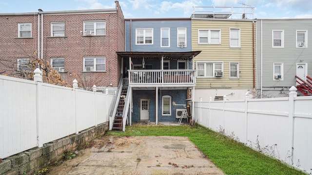 2350 Waterbury Ave, Bronx, NY 10462 - back of property with stairs, a fenced backyard, cooling unit, and a patio