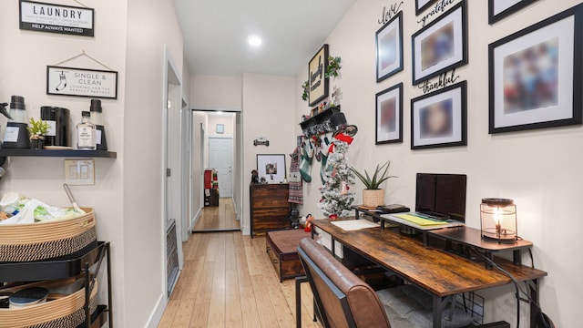 office with light hardwood / wood-style floors