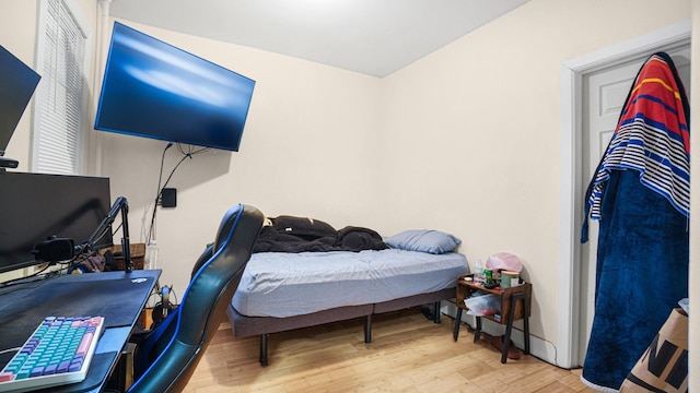 bedroom featuring light wood-type flooring