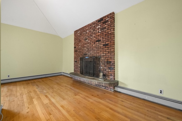 unfurnished living room with a brick fireplace, lofted ceiling, light hardwood / wood-style flooring, and a baseboard radiator