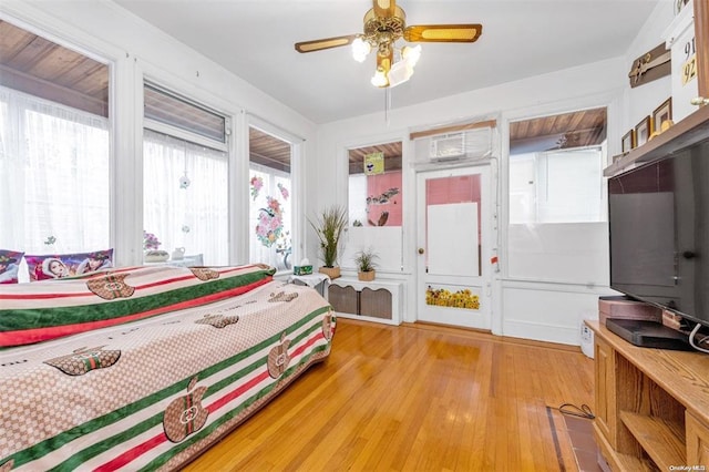 bedroom featuring ceiling fan and wood-type flooring