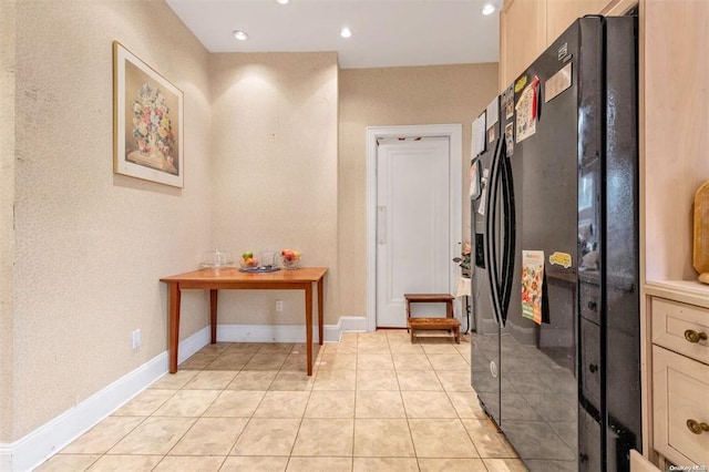 interior space with light tile patterned floors