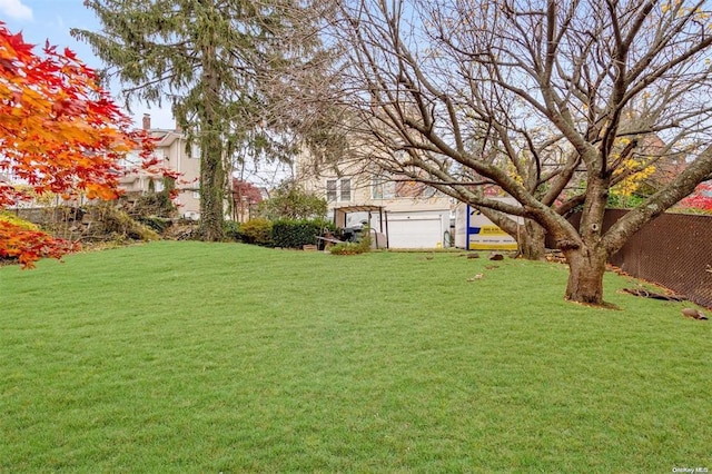 view of yard with a garage