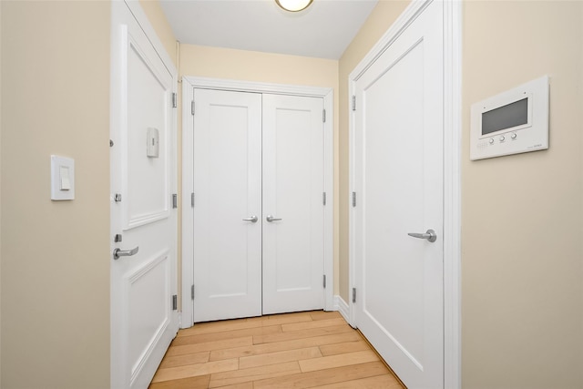 doorway to outside featuring light hardwood / wood-style flooring