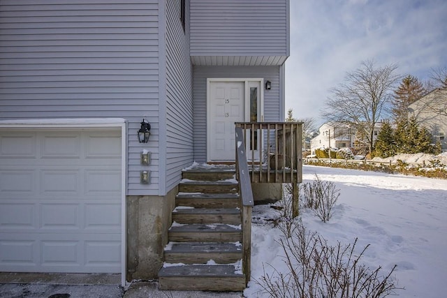 view of snow covered property entrance