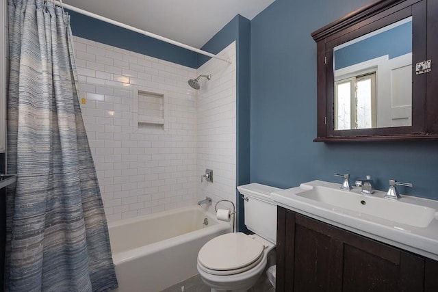 full bathroom featuring vanity, toilet, and shower / bath combo