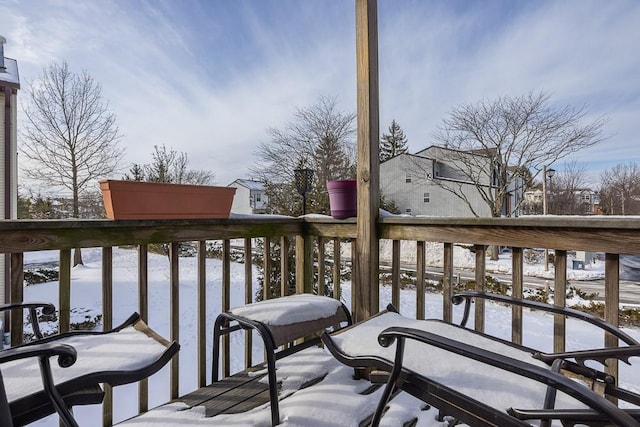 view of snow covered deck