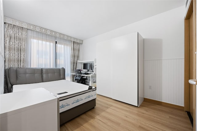 bedroom featuring light wood-type flooring