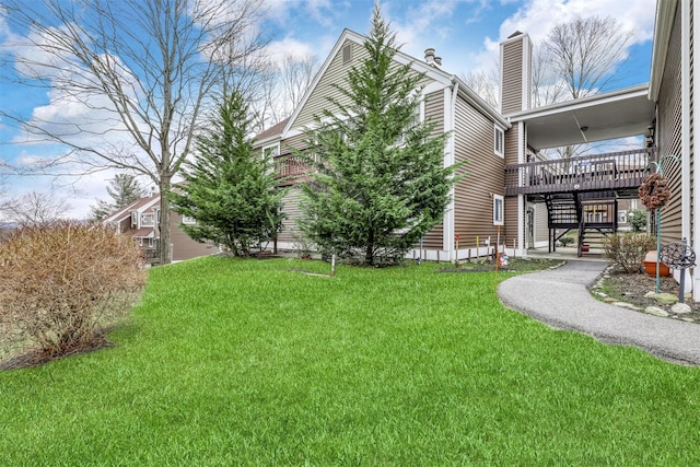 view of yard featuring stairway