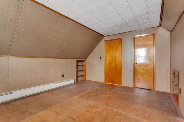 bonus room with wood walls, built in features, lofted ceiling, and a baseboard heating unit