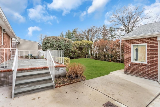 view of yard with a patio area