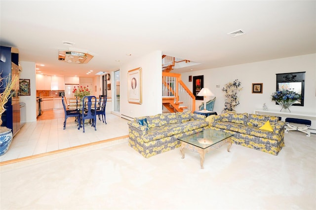 living room featuring baseboard heating