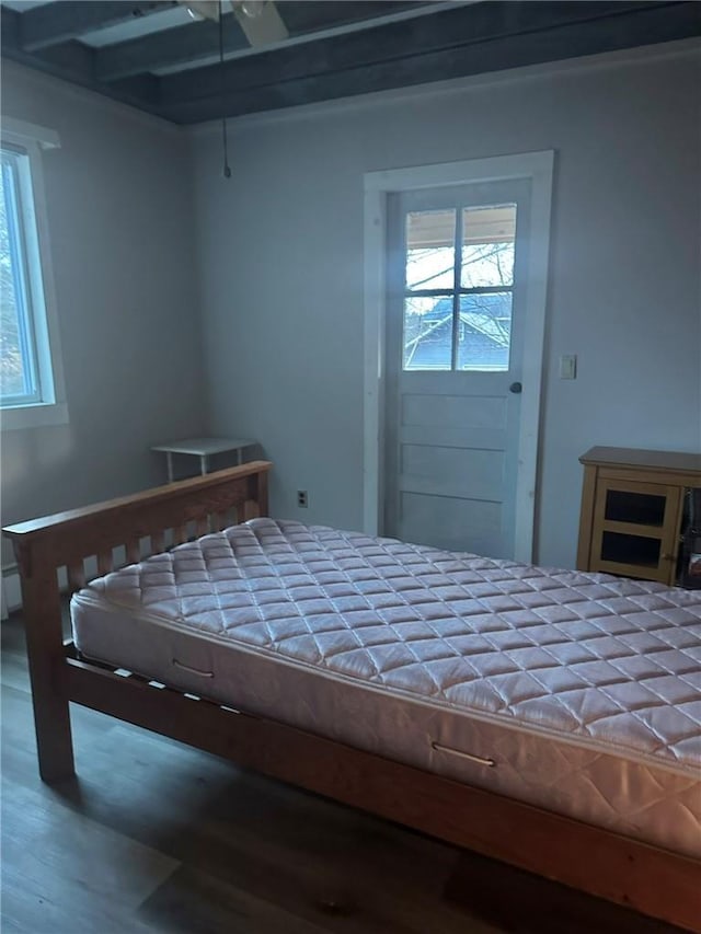 unfurnished bedroom featuring hardwood / wood-style floors