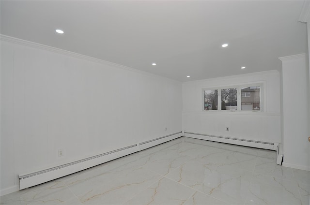 spare room with ornamental molding and a baseboard radiator