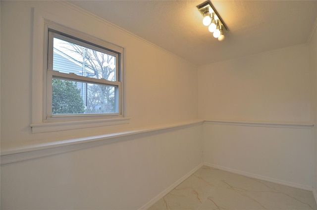 unfurnished room featuring a textured ceiling