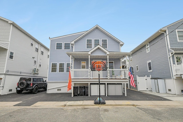 view of front facade with a porch and cooling unit