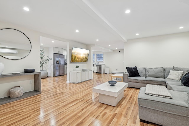 living room with light hardwood / wood-style floors