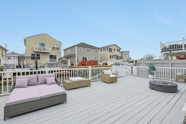 wooden deck with an outdoor hangout area