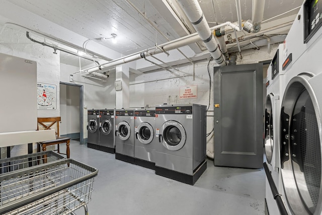 laundry room featuring washer and clothes dryer