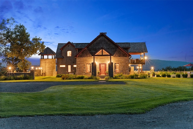 view of front of house with a lawn