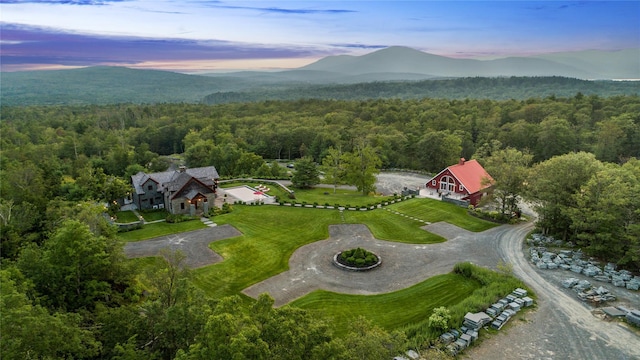 aerial view at dusk with a mountain view
