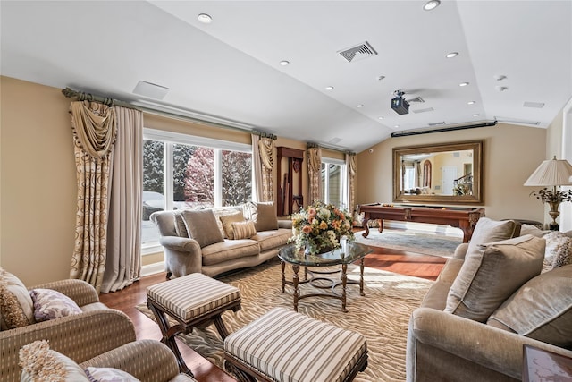 living room with hardwood / wood-style flooring, vaulted ceiling, pool table, and a healthy amount of sunlight