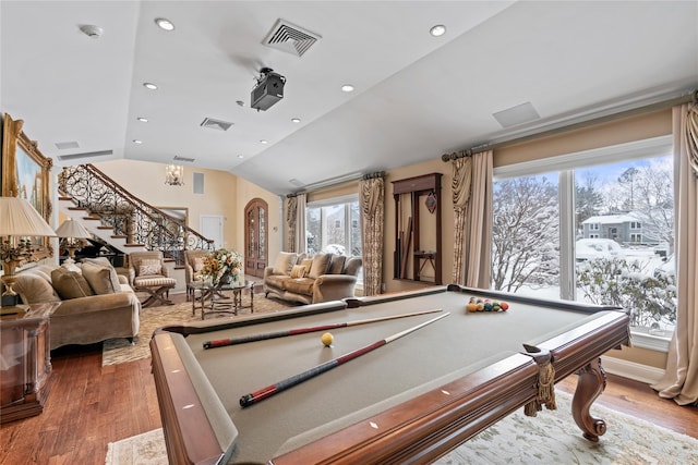 recreation room featuring lofted ceiling, hardwood / wood-style flooring, and billiards