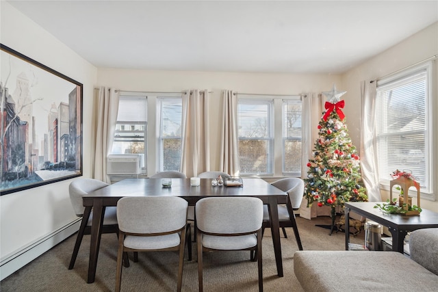 carpeted dining area featuring a wealth of natural light, a baseboard heating unit, and cooling unit