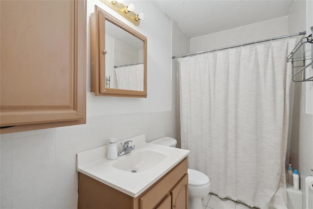 bathroom with toilet, tile patterned flooring, a shower with curtain, and vanity