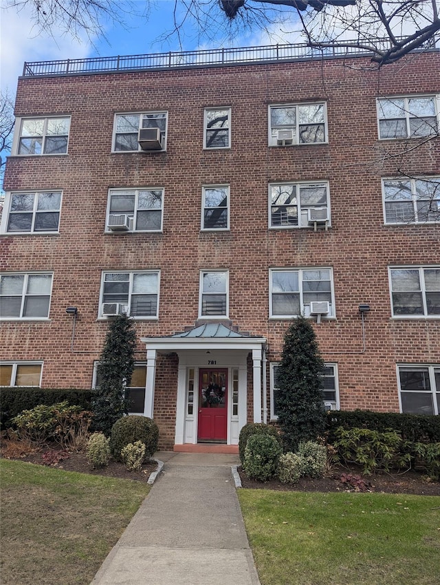 view of building exterior featuring cooling unit