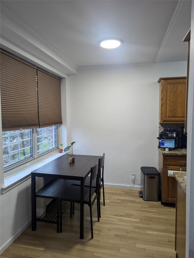 dining room featuring light hardwood / wood-style flooring