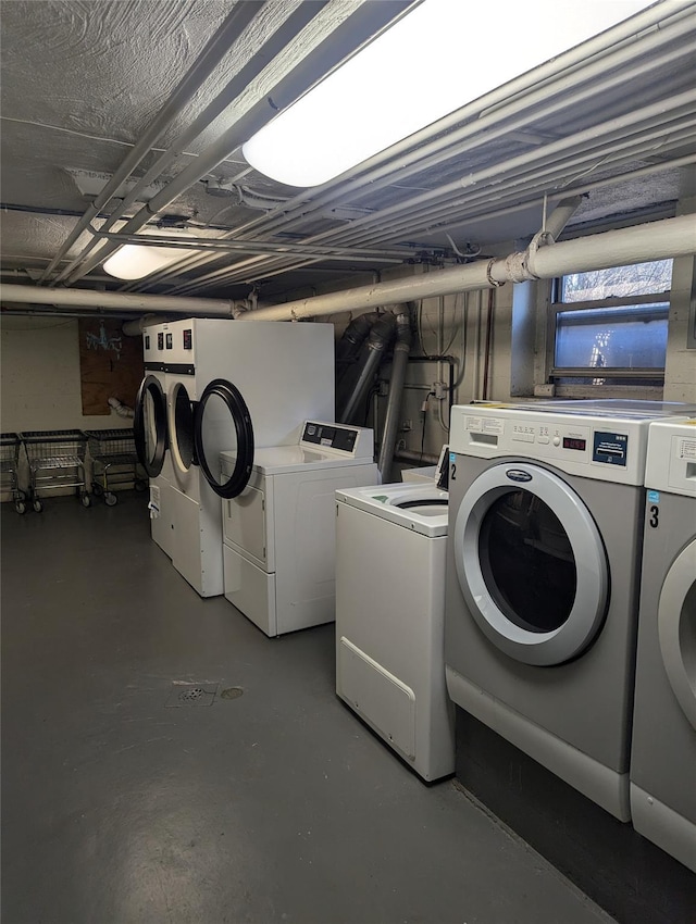 washroom featuring washer and clothes dryer