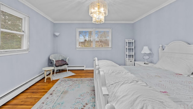 bedroom featuring a chandelier, a baseboard radiator, hardwood / wood-style flooring, and ornamental molding