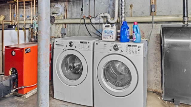 washroom with independent washer and dryer