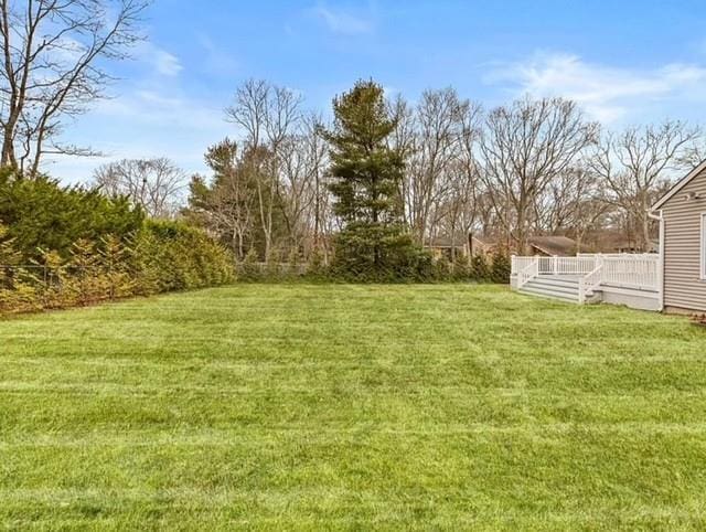 view of yard featuring a deck