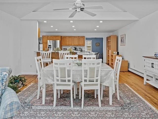 dining area featuring light wood-style flooring, ceiling fan, and recessed lighting