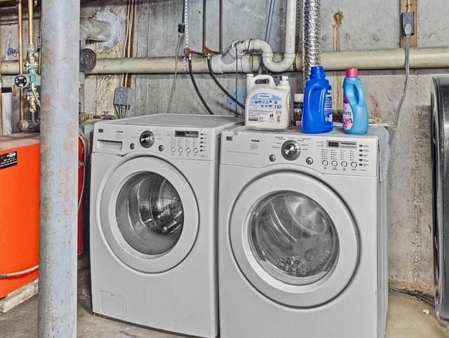 laundry room with independent washer and dryer