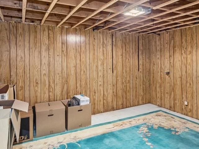 interior space with a sauna and wooden walls